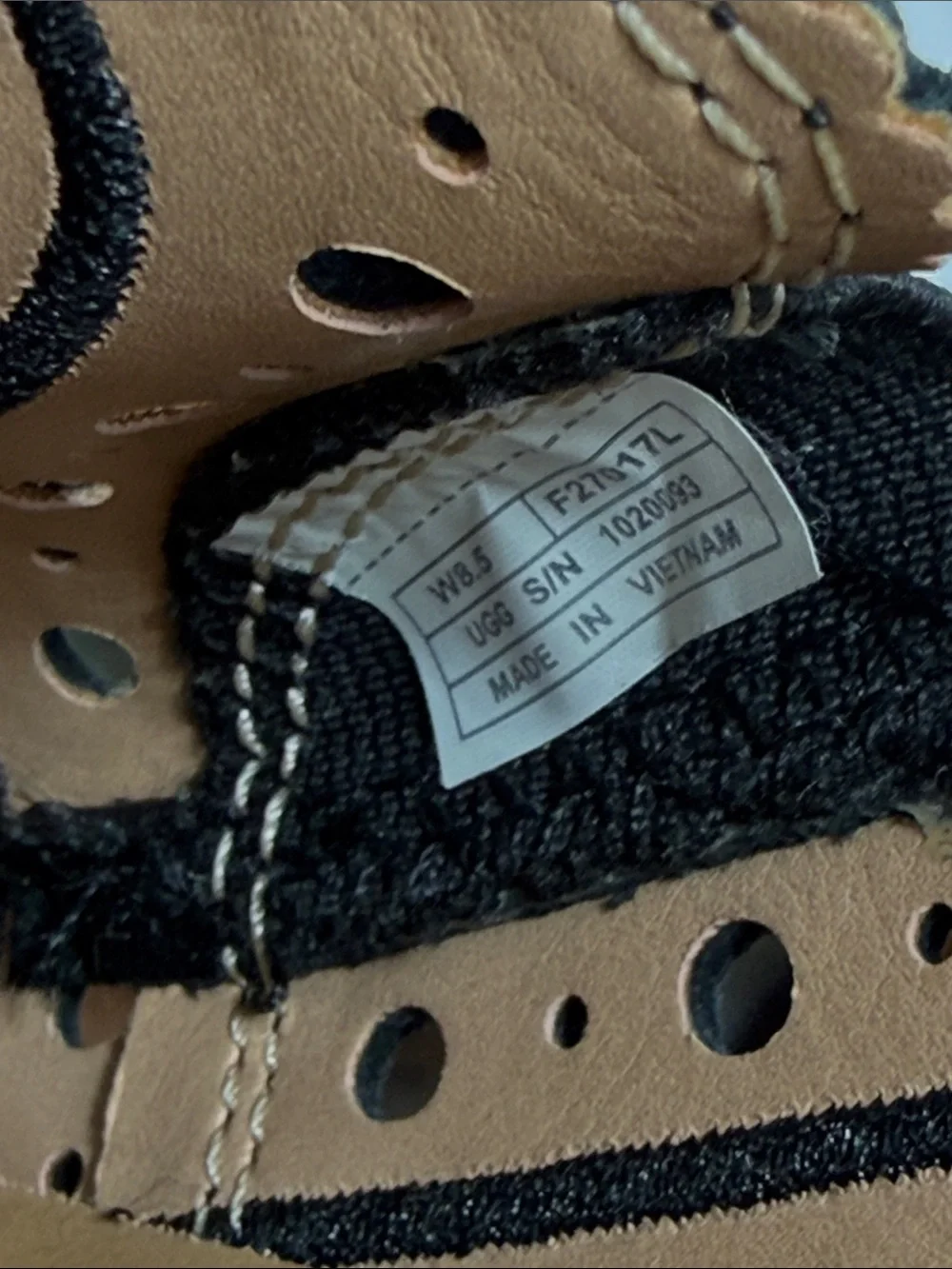 UGG CAS‎ Perforated Slip On Sneaker in Black.